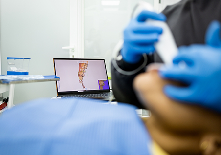 Dental patient having digital impressions of their teeth taken