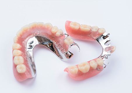 Bird’s eye view of partial dentures with metallic clips