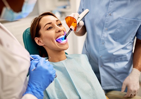 A woman getting a tooth-colored filling