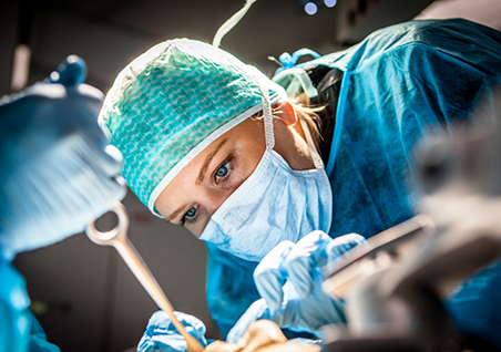 Dentist performing gum disease treatment on a patient
