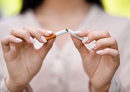 Patient breaking cigarette