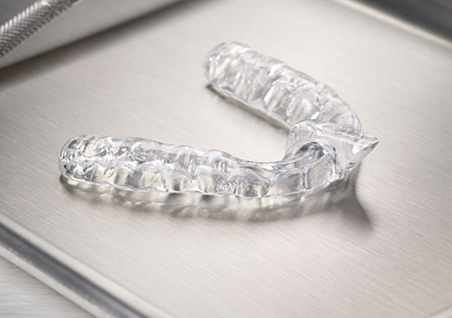 Clear nightguard on a metal tray