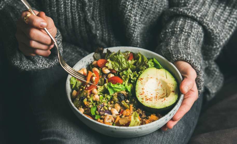 Woman eating salad